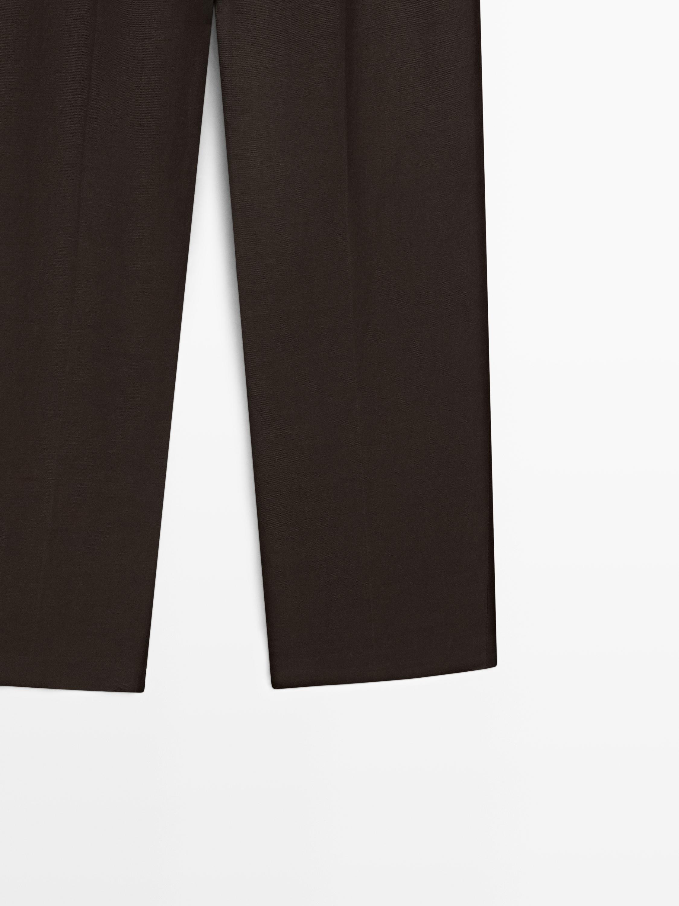 Pantalon à pinces avec passants - STUDIO
